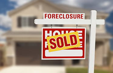 Image showing Sold Foreclosure Home For Sale Sign and House