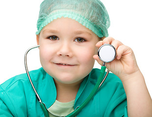 Image showing Little girl is playing doctor with stethoscope