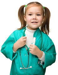 Image showing Cute little girl is playing doctor