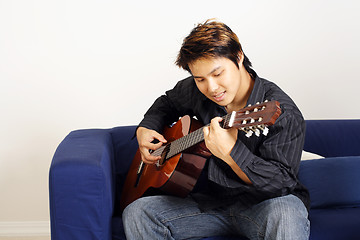 Image showing Guitar player