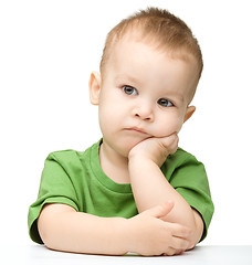 Image showing Portrait of a cute and pensive little boy