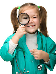 Image showing Cute little girl is playing doctor