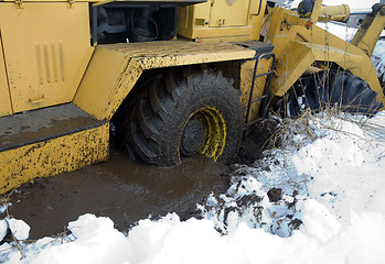 Image showing Tractor stuck in the mud