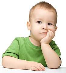 Image showing Portrait of a cute and pensive little boy