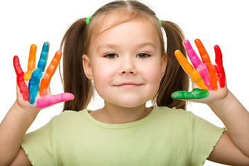 Image showing Cute cheerful girl with painted hands