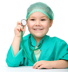 Image showing Little girl is playing doctor with stethoscope