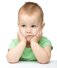 Image showing Portrait of a cute and pensive little boy