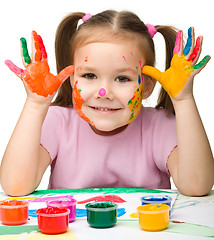 Image showing Cute cheerful girl with painted hands