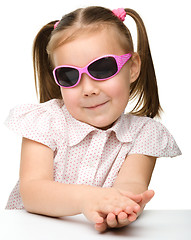 Image showing Little girl wearing sunglasses