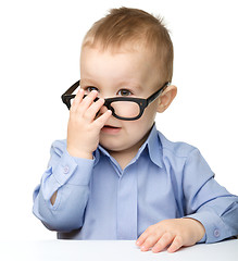 Image showing Portrait of a cute little boy wearing glasses