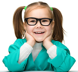 Image showing Cute little girl is playing doctor