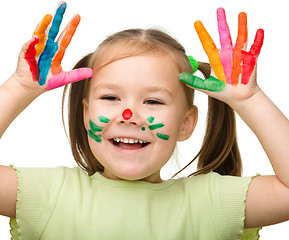 Image showing Cute cheerful girl with painted hands