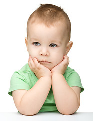 Image showing Portrait of a cute and pensive little boy