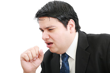 Image showing young ill businessman coughing isolated over white background 