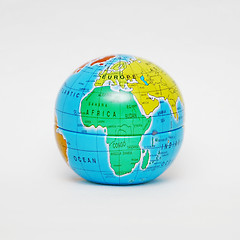 Image showing close up of globe on white background 