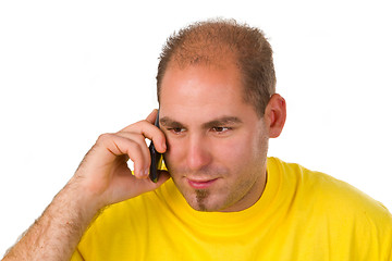 Image showing Young man talking on a cell phone