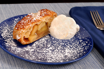 Image showing Apple strudel with vanilla ice cream