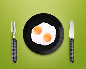 Image showing Two fried eggs on a Plate