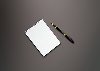 Image showing a pen and blank paper on the table 