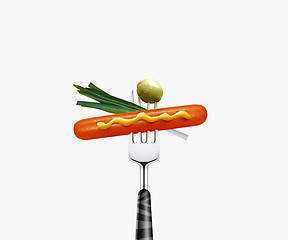 Image showing Hotdog on fork