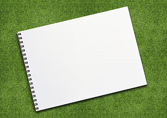 Image showing Notebook on grassland