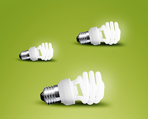 Image showing Three glowing Light bulb idea on green background