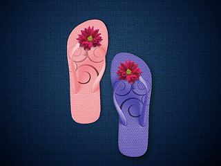 Image showing Colorful Flip Flops on dark blue background