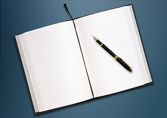 Image showing a pen and blank paper on the table 