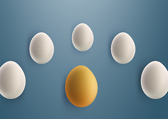 Image showing unique golden egg between white eggs