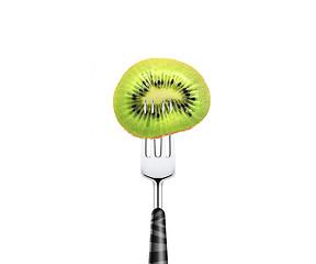 Image showing kiwi slice pierced by fork,  isolated on white background 