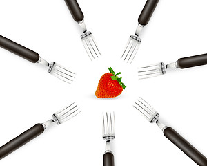 Image showing one strawberry between set of forks