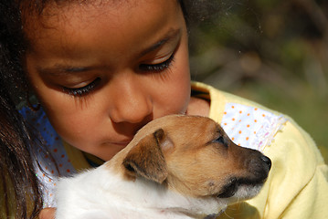 Image showing little girl and puppy