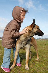 Image showing little girl and malinois