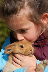 Image showing little girl and her bunny