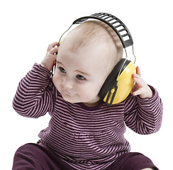 Image showing baby with ear protection