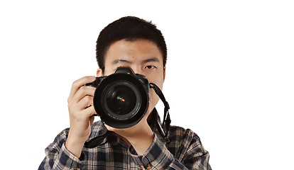 Image showing Male photographer holding camera