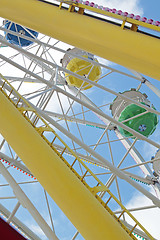 Image showing ferris wheel against a blue sky