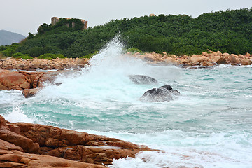 Image showing rocky sea coast and blurred water in shek o,hong kong 