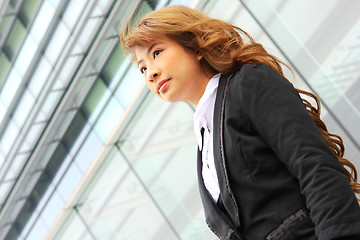 Image showing portrait of a young business woman in an office 