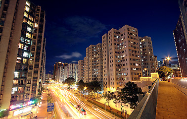 Image showing modern urban city at night with freeway traffic