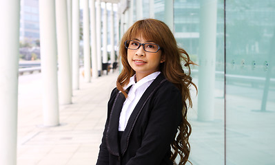 Image showing portrait of a young business woman in an office 