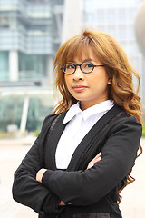 Image showing portrait of a young business woman in an office 