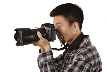 Image showing Male photographer holding camera
