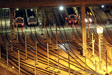 Image showing Train tracks in hongkong by night.