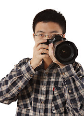 Image showing Male photographer holding camera