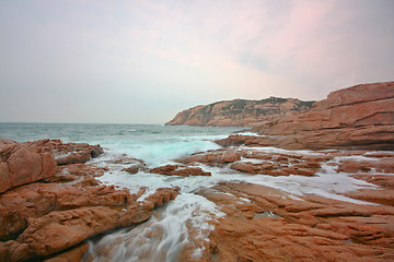 Image showing rocky sea coast and blurred water in shek o,hong kong 