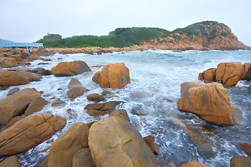 Image showing rocky sea coast and blurred water in shek o,hong kong 