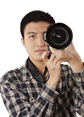 Image showing Male photographer holding camera