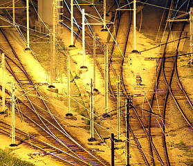 Image showing Train tracks in hongkong by night.