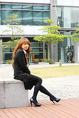 Image showing portrait of a young business woman in an office 